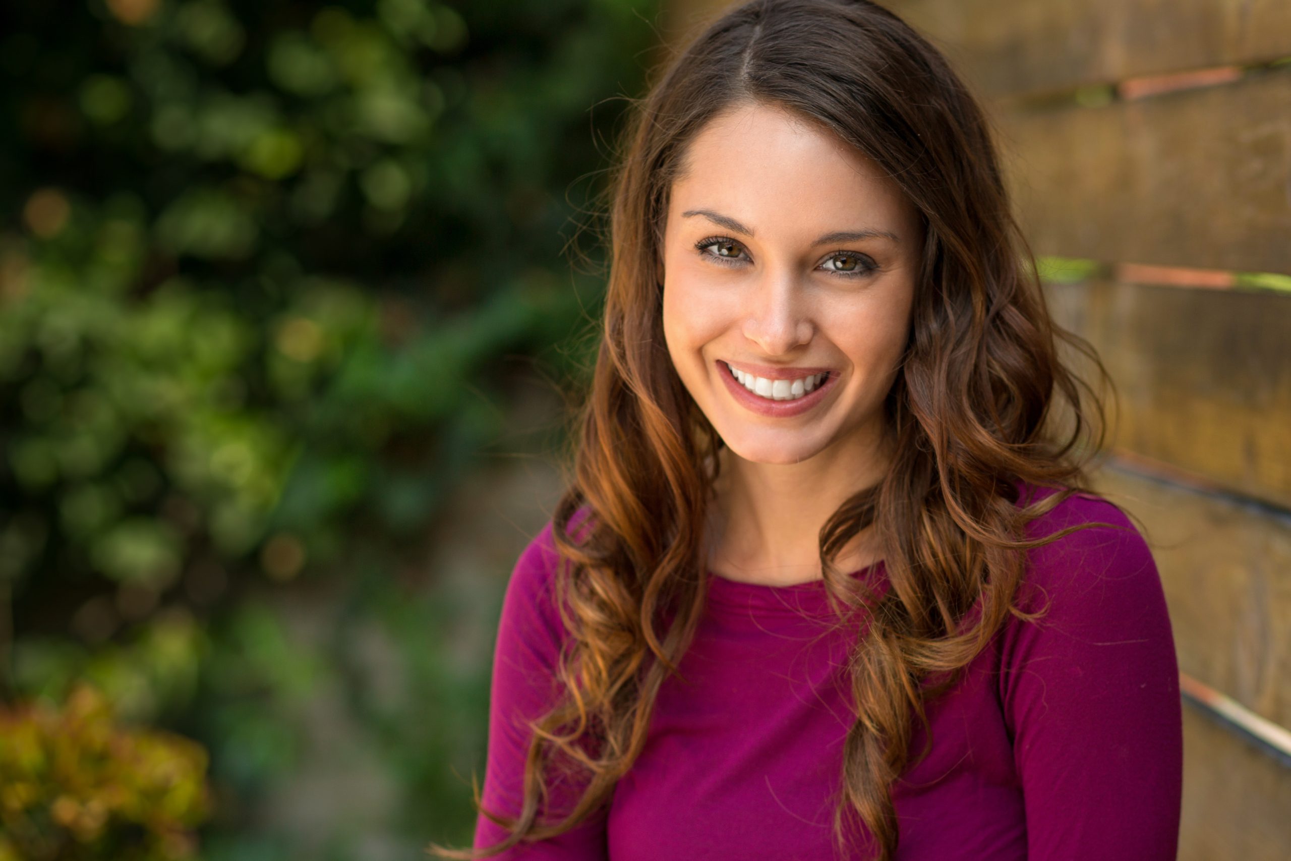 Pretty portrait of a beautiful lady with nice hair and skin and Veneer Follow-Up